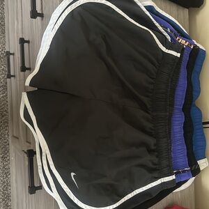 4 pairs of Nike Women’s Dry Tempo Running Shorts Size Large